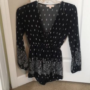 Super cute long sleeve black romper
